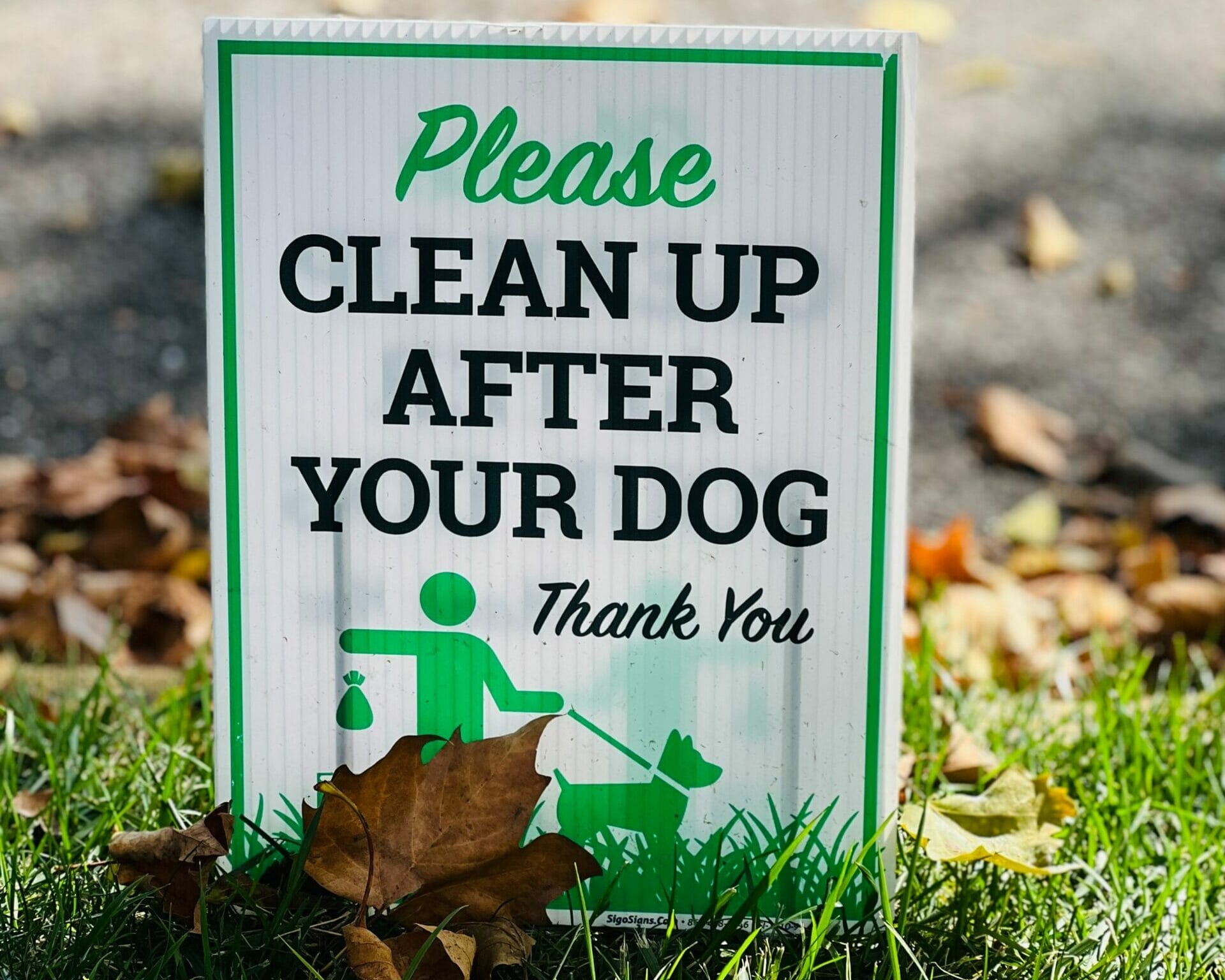 Pet waste cleanup sign in Northern Kentucky community